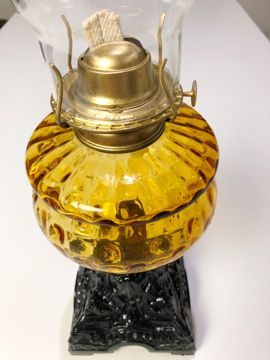 Vintage amber deals glass oil lamp